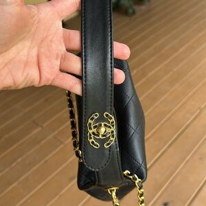 Elegant Black Hobo Bag with Gold Accents